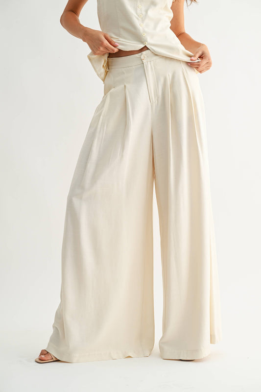 Wide-Leg Pleated Trousers: CREAM